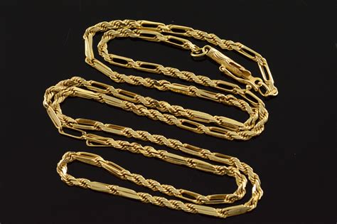 14k gold bar link chain.